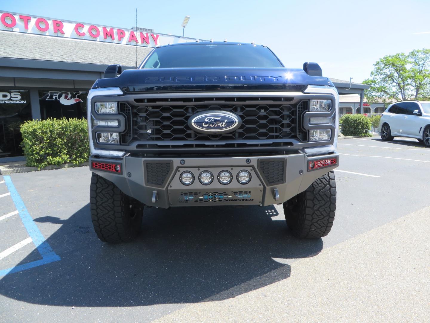 2023 BLUE /BLACK Ford F-350 SD Lariat Crew Cab Long Bed 4WD (1FT8W3BM9PE) with an 6.7L V8 OHV 16V DIESEL engine, 6A transmission, located at 2630 Grass Valley Highway, Auburn, CA, 95603, (530) 508-5100, 38.937893, -121.095482 - Sinister Diesel Built 23 Lariat Superduty with a ton of extras....... Sinister custom radius arms and traction bars, King Offroad shocks & Steering stabilizers, 18" Icon Rebound wheels, 37" Nitto Recon Grappler tires, Cat Back Exhaust, PMF rear leaf Springs, Sinister Front and Rear bumpers, Rigid Li - Photo#1